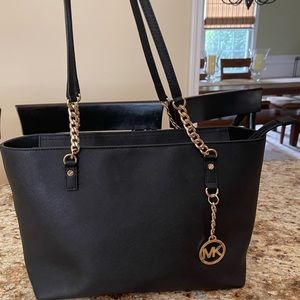 Back Micheal Kors Tote with gold accents!